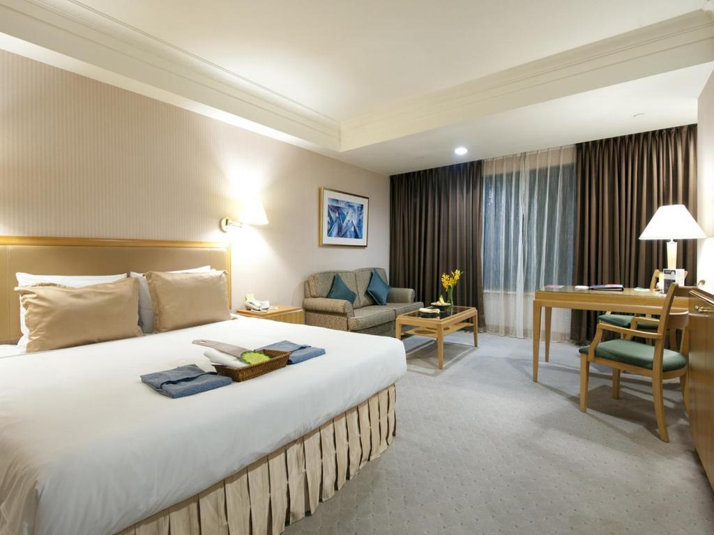 85 Sky Tower Hotel Kaohsiung Rum bild Deluxe Room