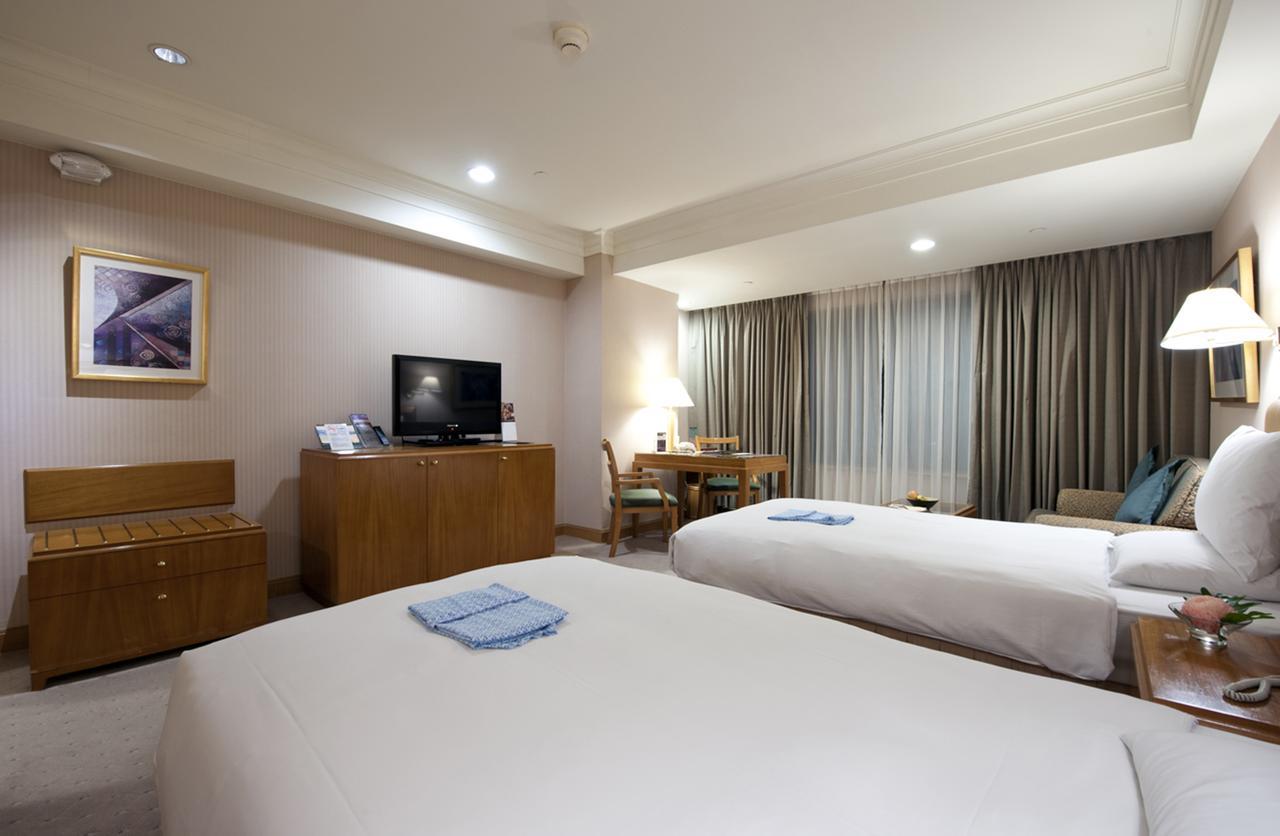85 Sky Tower Hotel Kaohsiung Exteriör bild Deluxe Room